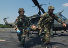 Medical Personnel Carry a Stretcher
